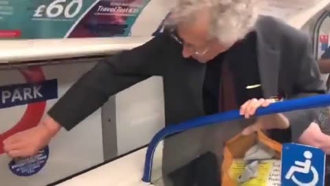 "They Didn't Keep Their Distance At The G7 Did They?" Man Removes Covid Signage On London Metro