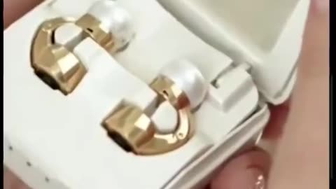 Kamala's audio ear rings.