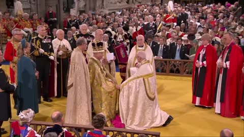 Prince William kisses King Charles on cheek in Coronation ceremony - BBC News