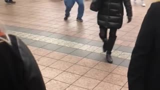 Man in blue shirt spinning