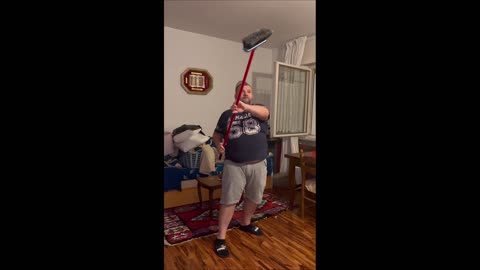 Dad And Cat Try To Catch Bat