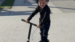 Young Scooter Rider Lands Tail Whip