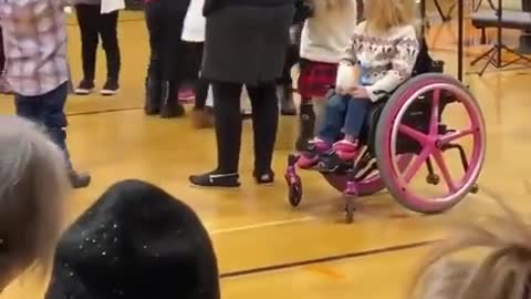 Teacher Ignores Young Student in Wheelchair as the Rest of the Class Sings Songs