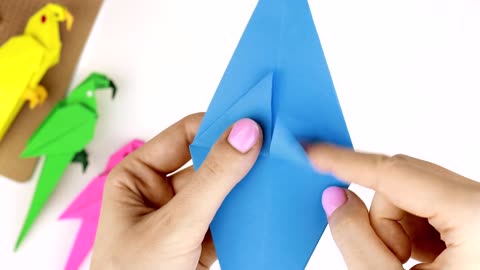 How to construct a paper bird: origami parrot