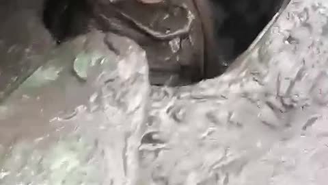 Ukrainian Tank Driver with a Mouthful of Mud