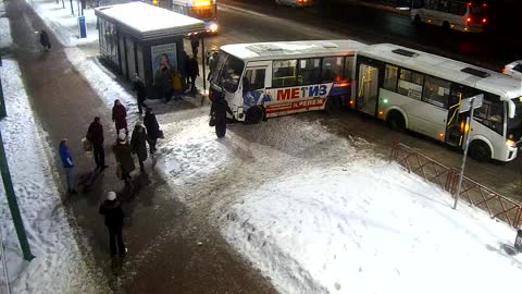 Bus Nearly Runs Over Pedestrians Due to Icy Roads