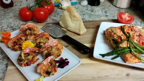 CrabCake Stuffed Shrimp, Stuffed Salmon, Asparagus and Tortelini tossed a tomato basil cream sauce by ChefDeon843