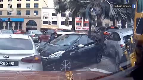 Miraculous escape for Myvi driver in multiple vehicle crash