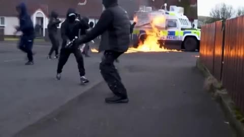 Masked men attack police vehicle with petrol bombs in Derry