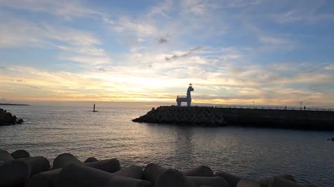 Jeju Island Iho Beach Red Horse Lighthouse Sunset Scenery in Korea