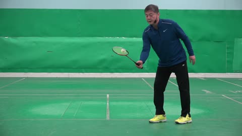 How to Pick Up a Shuttlecock Off the Floor in Badminton