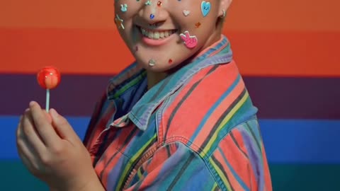 Happy Woman with Stickers on Her Face