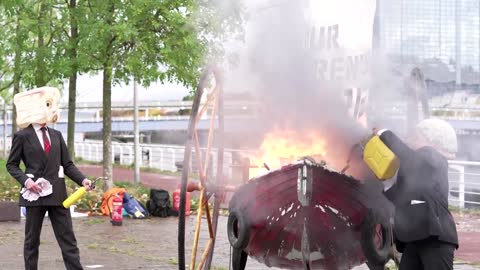 Flaming protest near climate summit venue