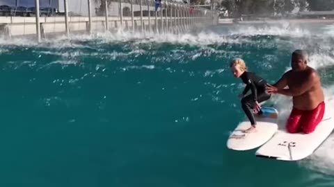 Lil Surfer with Raimana at Surf Ranch - Best Coach!