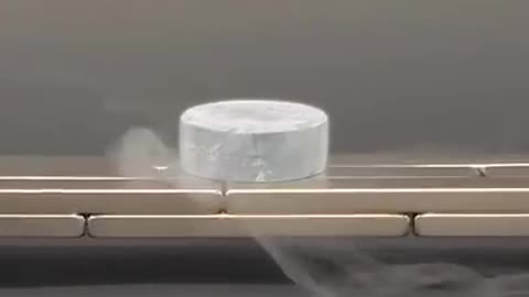 Watch this superconductor hover around in mid-air!