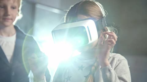 A girl wearing a Virtual Reality headset