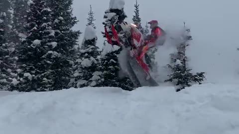 Snowmobile Jump Leads Directly Into Tree