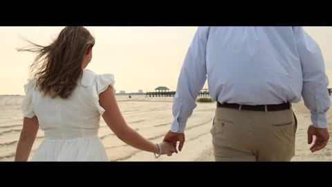 Engaged couple on the beach