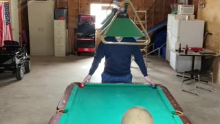 Man Bamboozles Son with Pool Trick Shot Gag