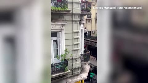 Argentine woman escapes fire by sliding down a cable