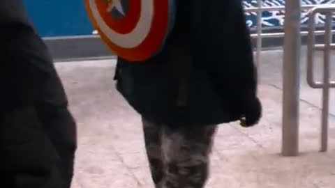 Guy with captain america shield backpack