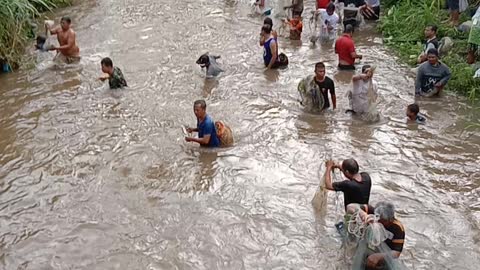 Traditional fishing net in river of vellage's