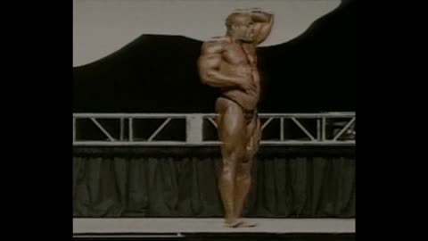 Bodybuilder Dances on Stage