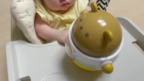 Baby playing with a wobble toy