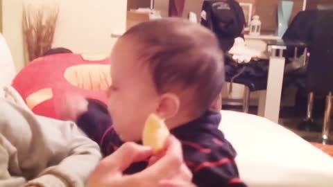 cute babies eating lemons for the first time?? try not to laugh