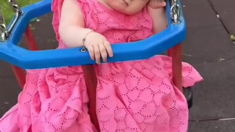 Cute baby is rocking and sleeping in the swing ❤️