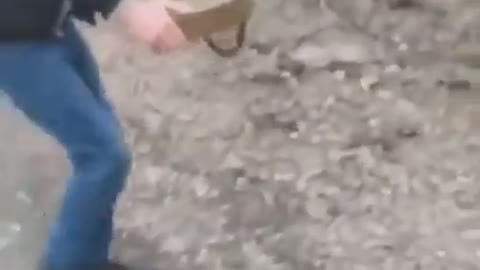 Ukrainian Man Removes Mine From Roadway While Smoking Cigarette