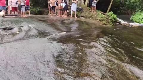 Surfing Down Slick Waterfall Rocks