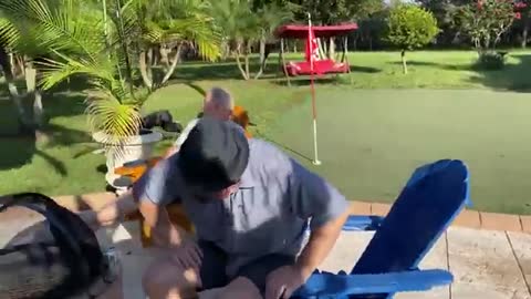 Puppy_plays_in_the_pool_for_the_very_first_time