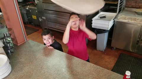 Pint Sized Pizza Tossing Brothers