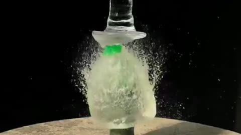 Sprinkling water in slow motion