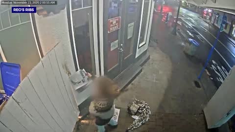 Restaurant owner targeted with arson. Make this person famous. Filmed in the act.