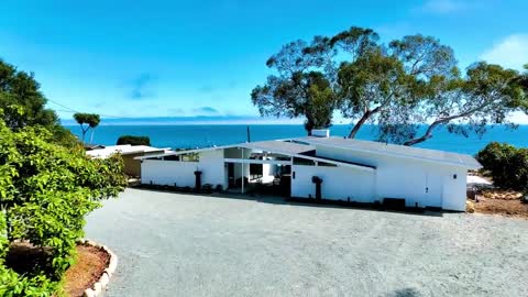 This $11,975,000 Completely renovate Mid-century home in Santa Barbara with captivating ocean views