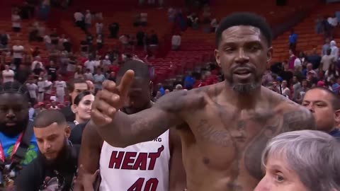 Udonis Haslem and Dwyane Wade share a moment postgame