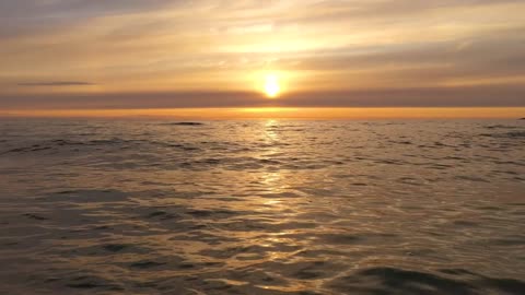 aerial view of a beautiful sunset over the sea beach lofoten archipelago norway