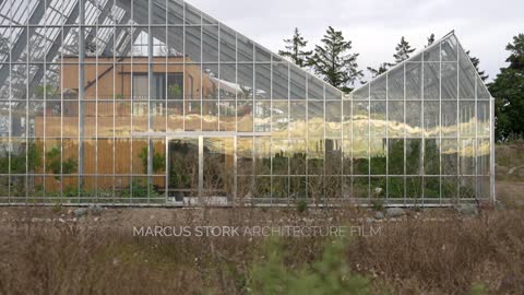 House in a Greenhouse by TailorMade Arkitekter