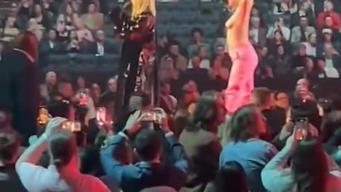 Avril Lavigne Kicks Half Naked Protestor Off Stage - Get The F**k Off, B*tch!”