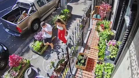 Pedestrians Play Hopscotch on Sidewalk