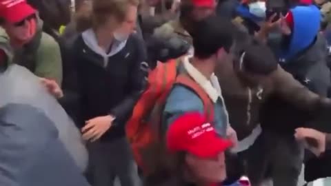 J6 -Trump supporters stop Antifa from breaking window