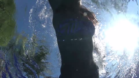 underwater swimming couple