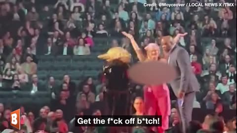 Avril Lavigne Tells Topless Green Activist Crashing Her Speech to "Get the F*ck Off"