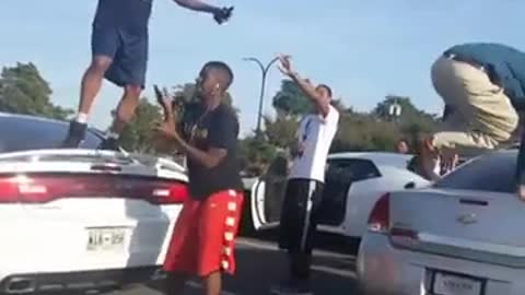 Collab copyright protection vibes - guy falls off car hood