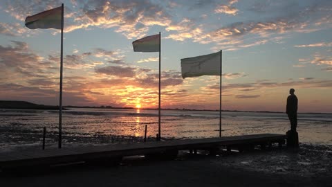 Sonnenuntergang am Kurhaus-Strand in Dangast im Sommer 2022