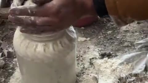 Heartbreaking video shows a Palestinian man trying to retrieve some flour