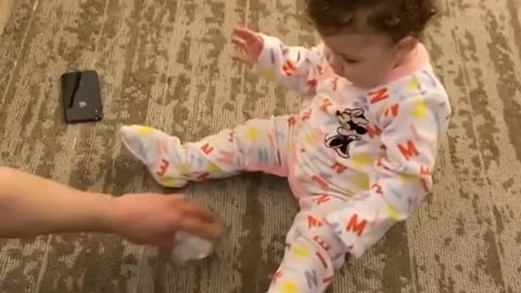 This very lucky toddler, being able to make a bottle stand up, is amazing