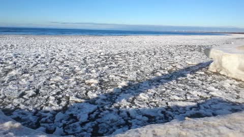 Floating snow on Lake Huron